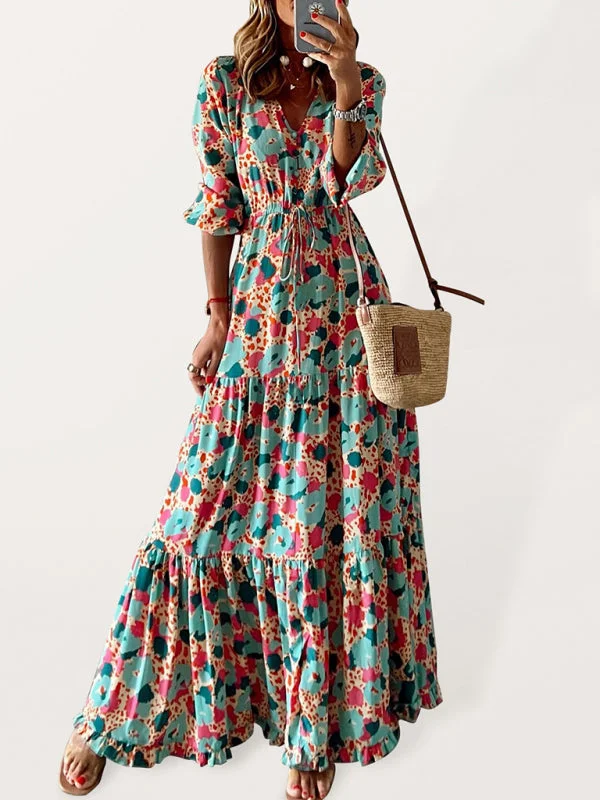 Elegant V-neck five-quarter-sleeved multicolored floral pleats stitching large swing dress Tunics Sophisticated sleek Elegant V-neck five-quarter-sleeved multicolored floral pleats stitching large swing dress Tunics Sophisticated sleek