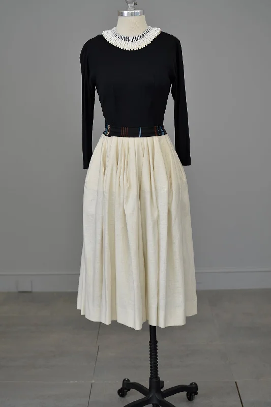 Early 1950s Black and Cream Egyptian Beaded Neckline Cocktail Party Dress | Jersey Bodice, Full Skirt | Bonwit Teller | XXS Tunics Sale discount Early 1950s Black and Cream Egyptian Beaded Neckline Cocktail Party Dress | Jersey Bodice, Full Skirt | Bonwit Teller | XXS Tunics Sale discount
