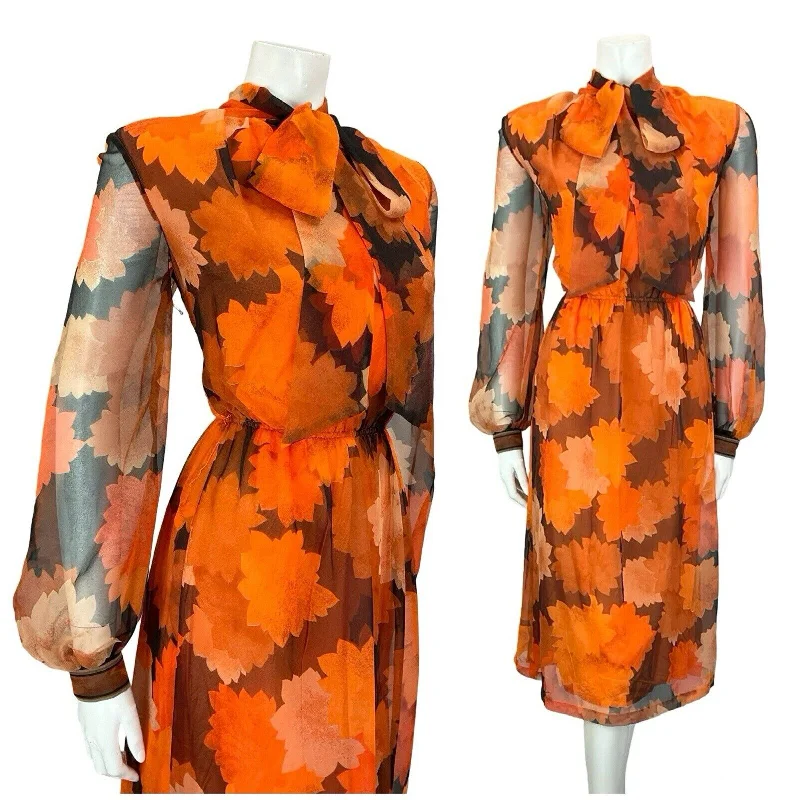 VTG 70S BLACK ORANGE FLORAL MESH BISHOP SLEEVE PUSSYBOW ELASTICATED DRESS S 8 10 Tunics Chic fashionable VTG 70S BLACK ORANGE FLORAL MESH BISHOP SLEEVE PUSSYBOW ELASTICATED DRESS S 8 10 Tunics Chic fashionable